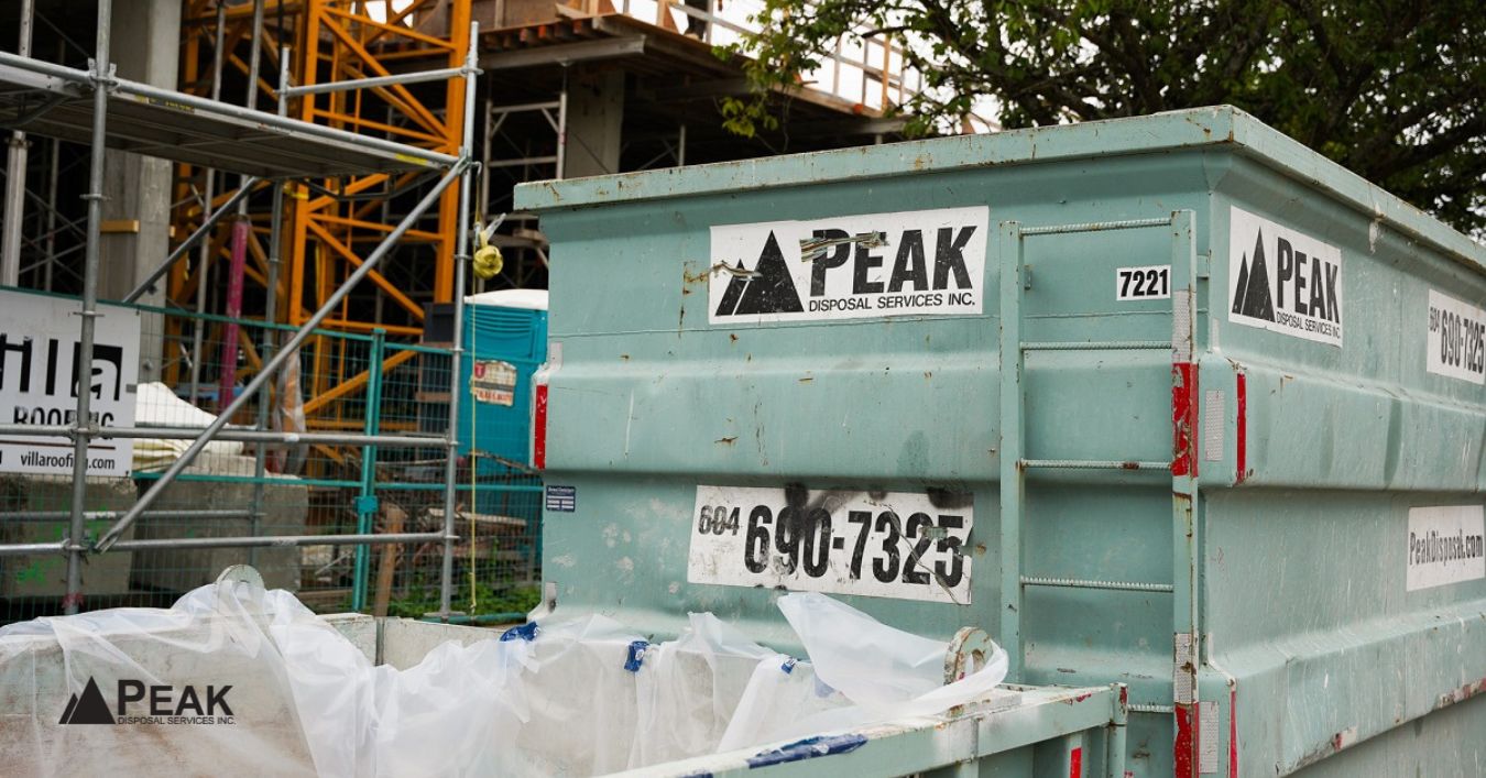 Construction dumpster on street near building site, illustrating when permits are required for bin placement on public property