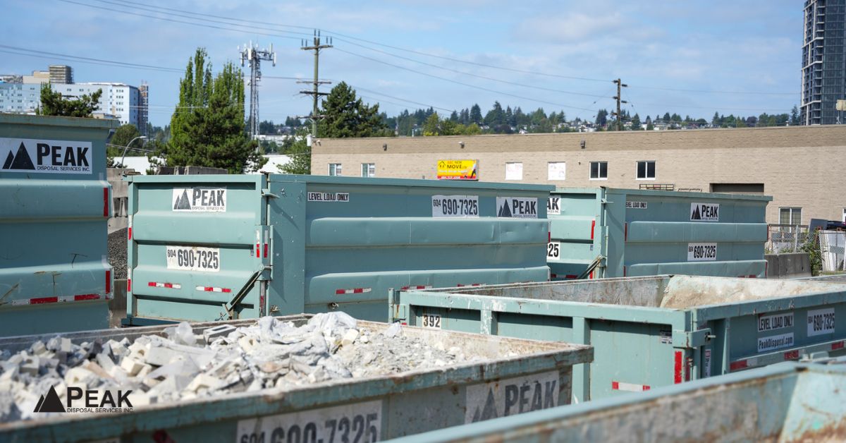Peak Disposal roll-off bins await excavation projects, helping contractors coordinate heavy-material disposal and hauling needs efficiently.